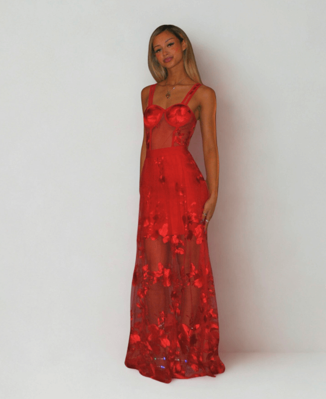 Lange jurk met bloemenprint en transparant detail aan de onderkant – Donna Colori collectie